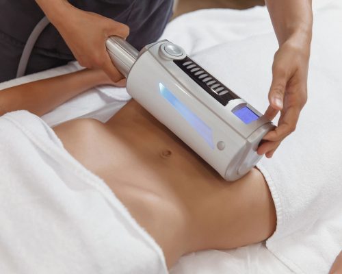cosmetologist-doing-endospheres-therapy-stomach-1-scaled